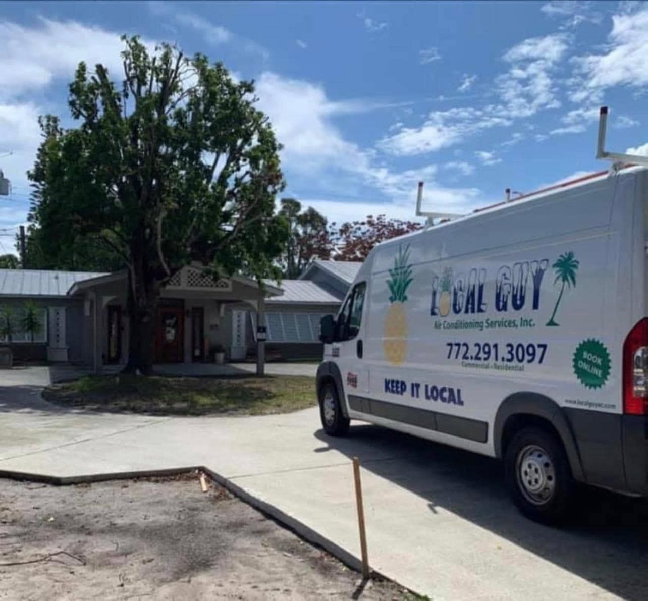 A Local Guy AC van with the word local on it