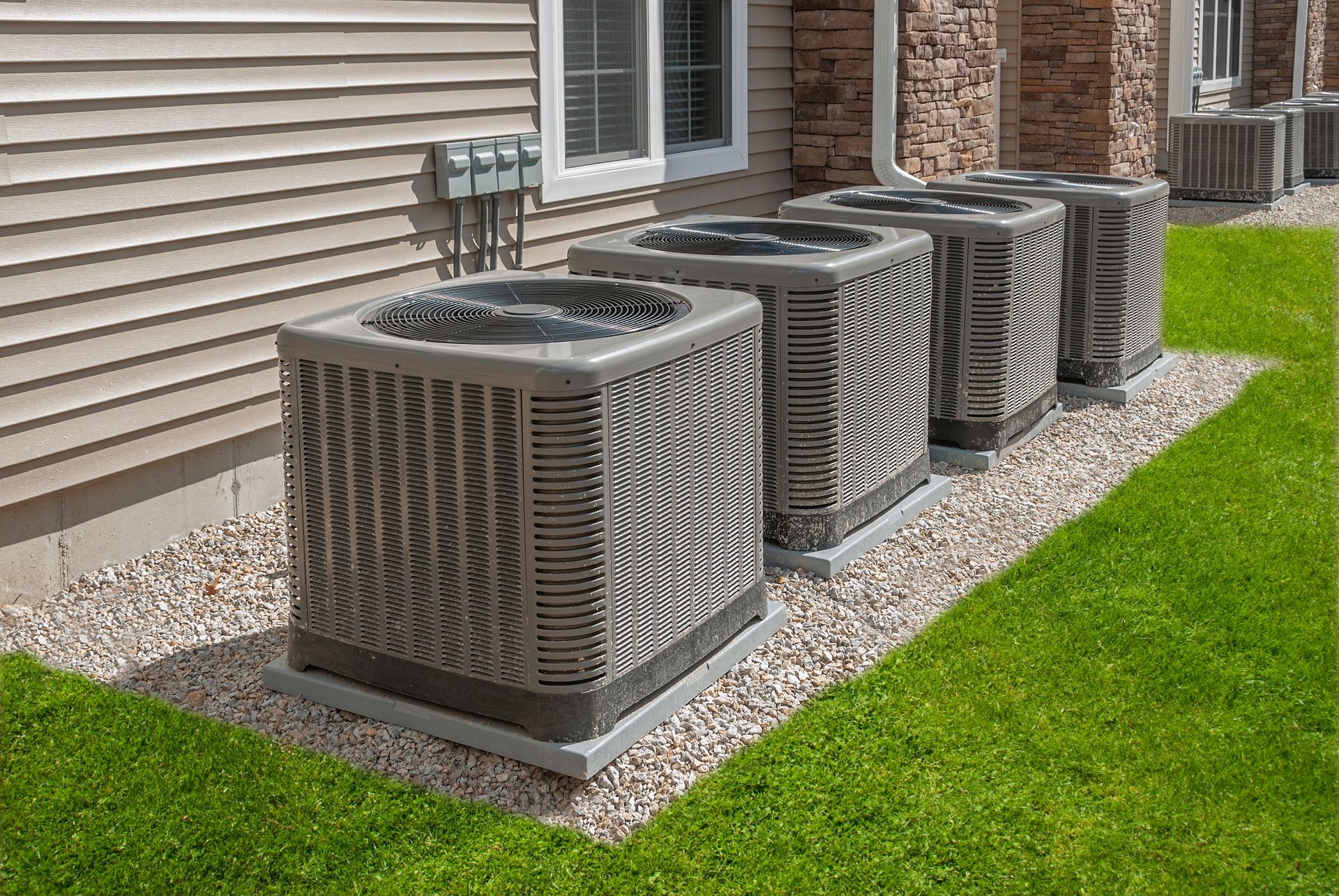 Outdoor air conditioning units at a residential unit in Palm City, Florida.