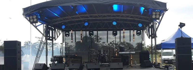 Stage Set Up With Lighting Effects — Kennedy Amplifier Hire Service In Mackay QLD