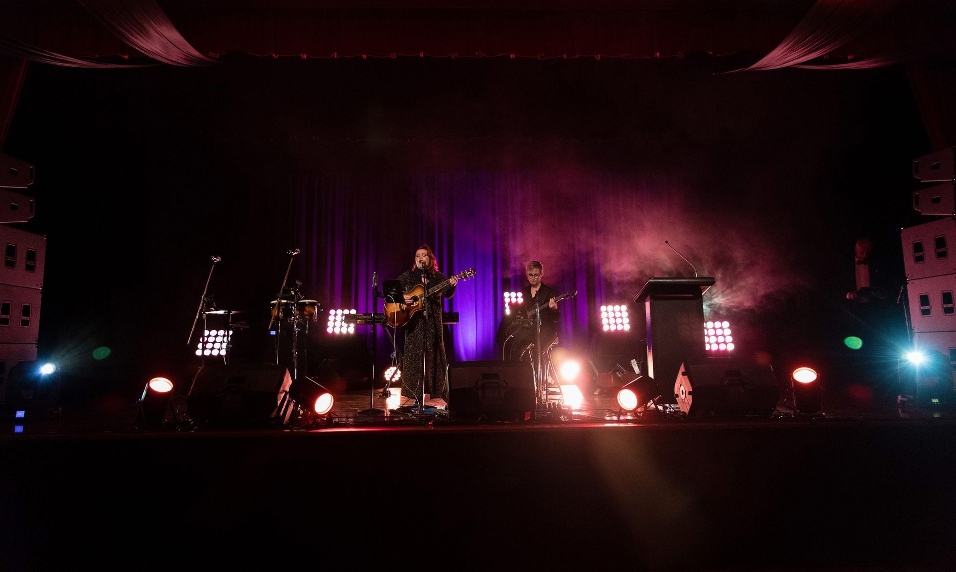 Two Girls Singing And Playing Guitar On The Stage β Kennedy Amplifier Hire Service In Mackay QLD