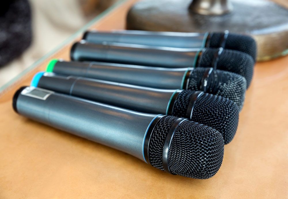 Wireless Microphones On The Table Closeup — Kennedy Amplifier Hire Service In Mackay QLD