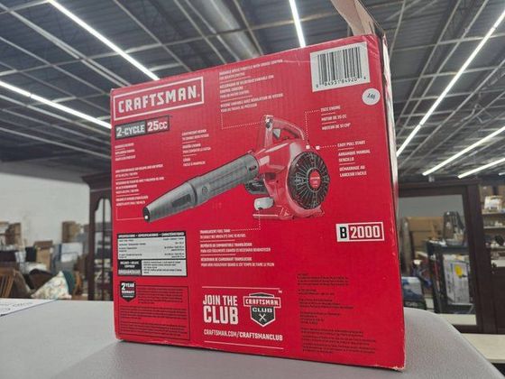 A box of a craftsman blower is sitting on a table