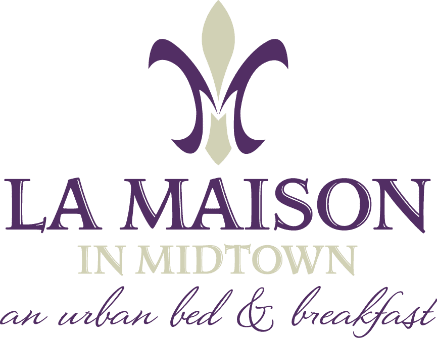 A logo for la maison in midtown an urban bed and breakfast