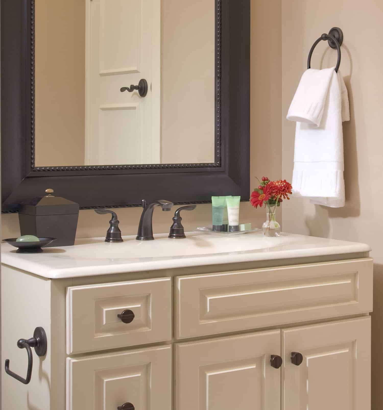 A bathroom vanity with a sink and a mirror