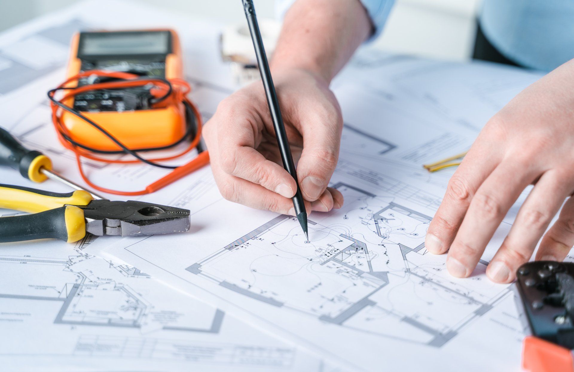License electrician creating an electrical blueprint