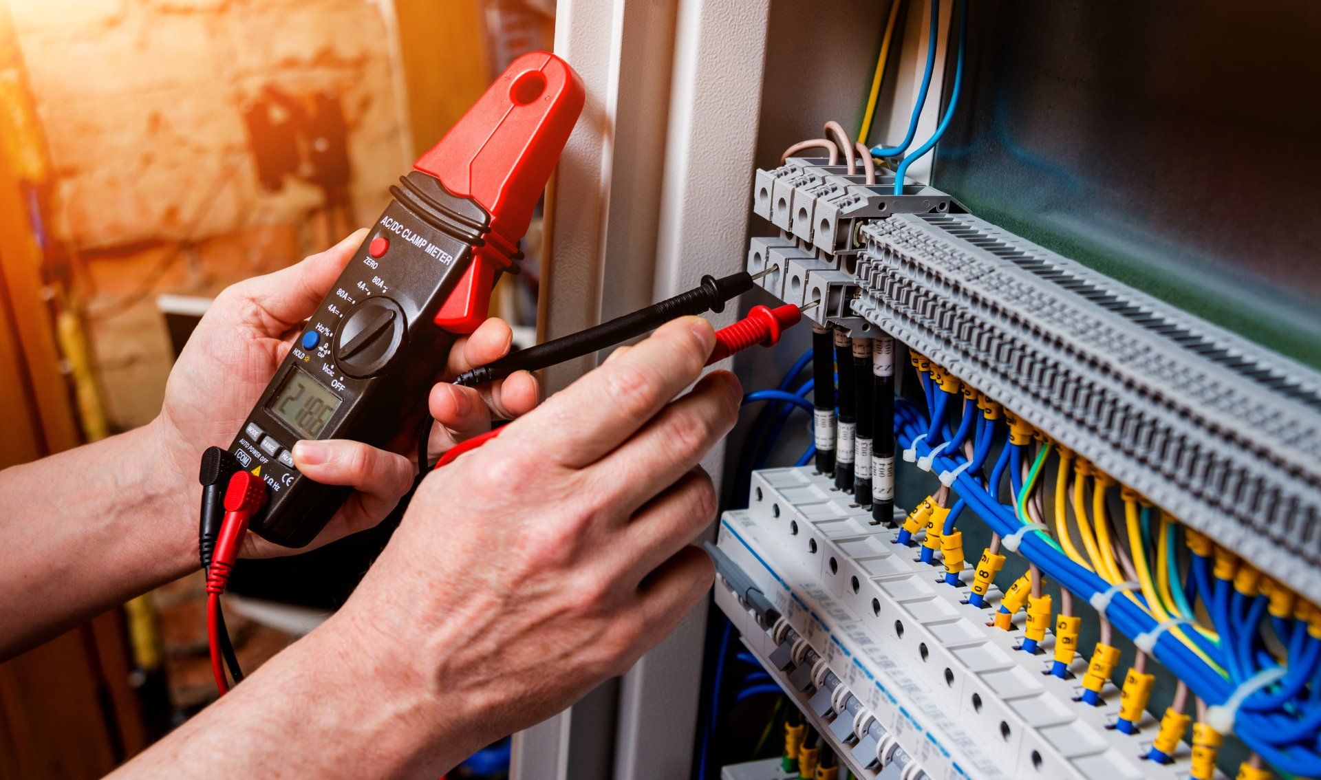 Electrician repairing the electrical panel