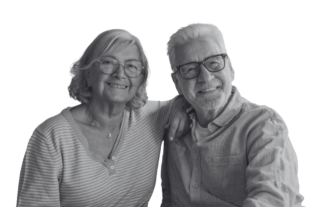 Woman with glasses, smiling, wearing a patterned shirt. Woman with glasses, smiling, wearing a patterned shirt.