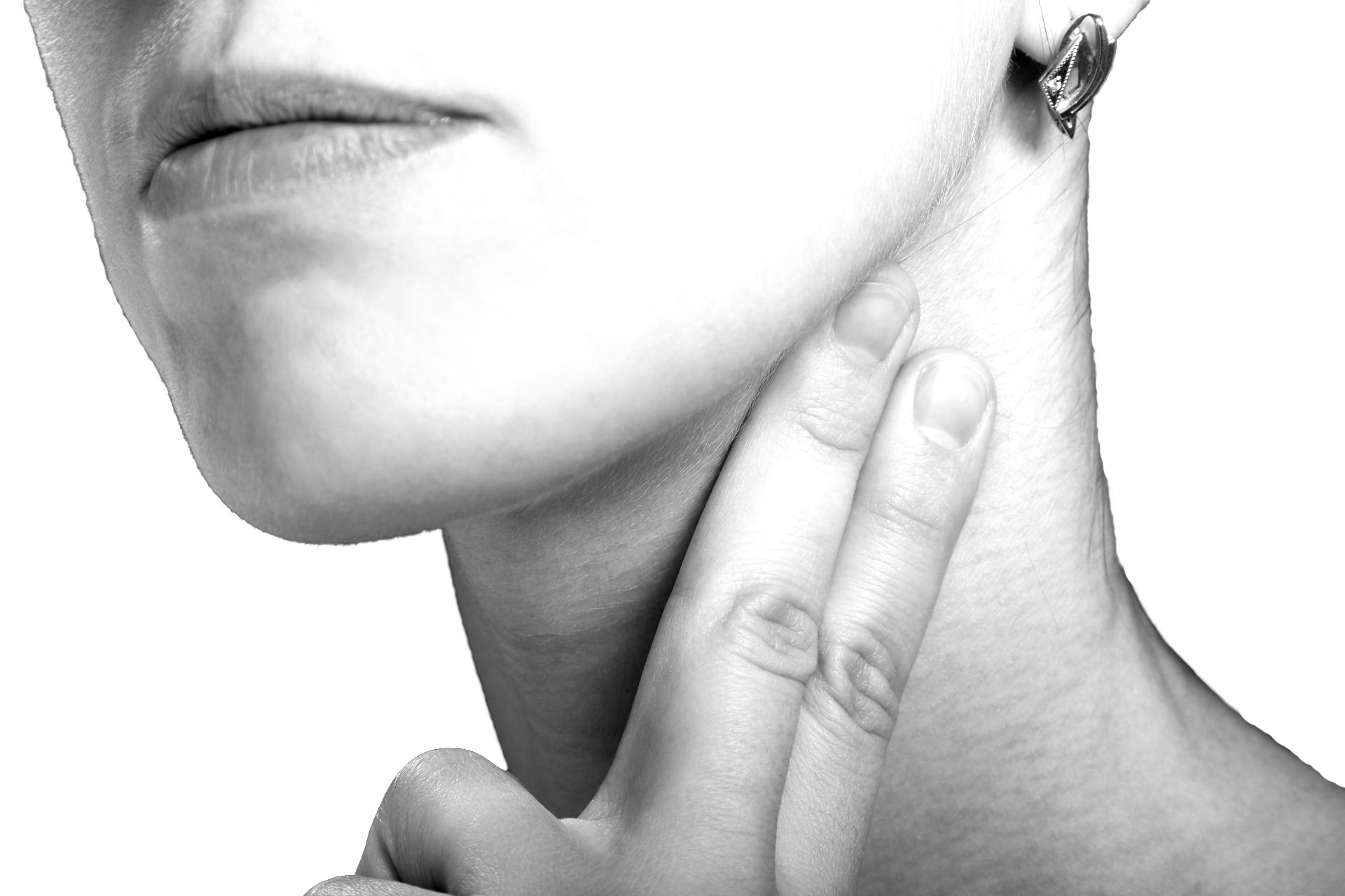 Person's fingers on neck, checking pulse. Close up in black and white. Person's fingers on neck, checking pulse. Close up in black and white.