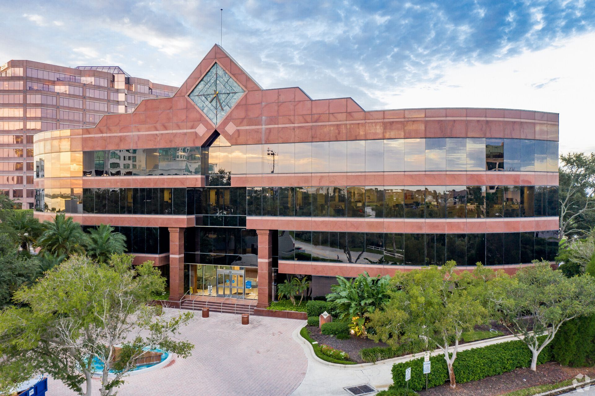 Patient lying on a CT scanner bed, preparing for a medical scan. Doctor standing nearby.