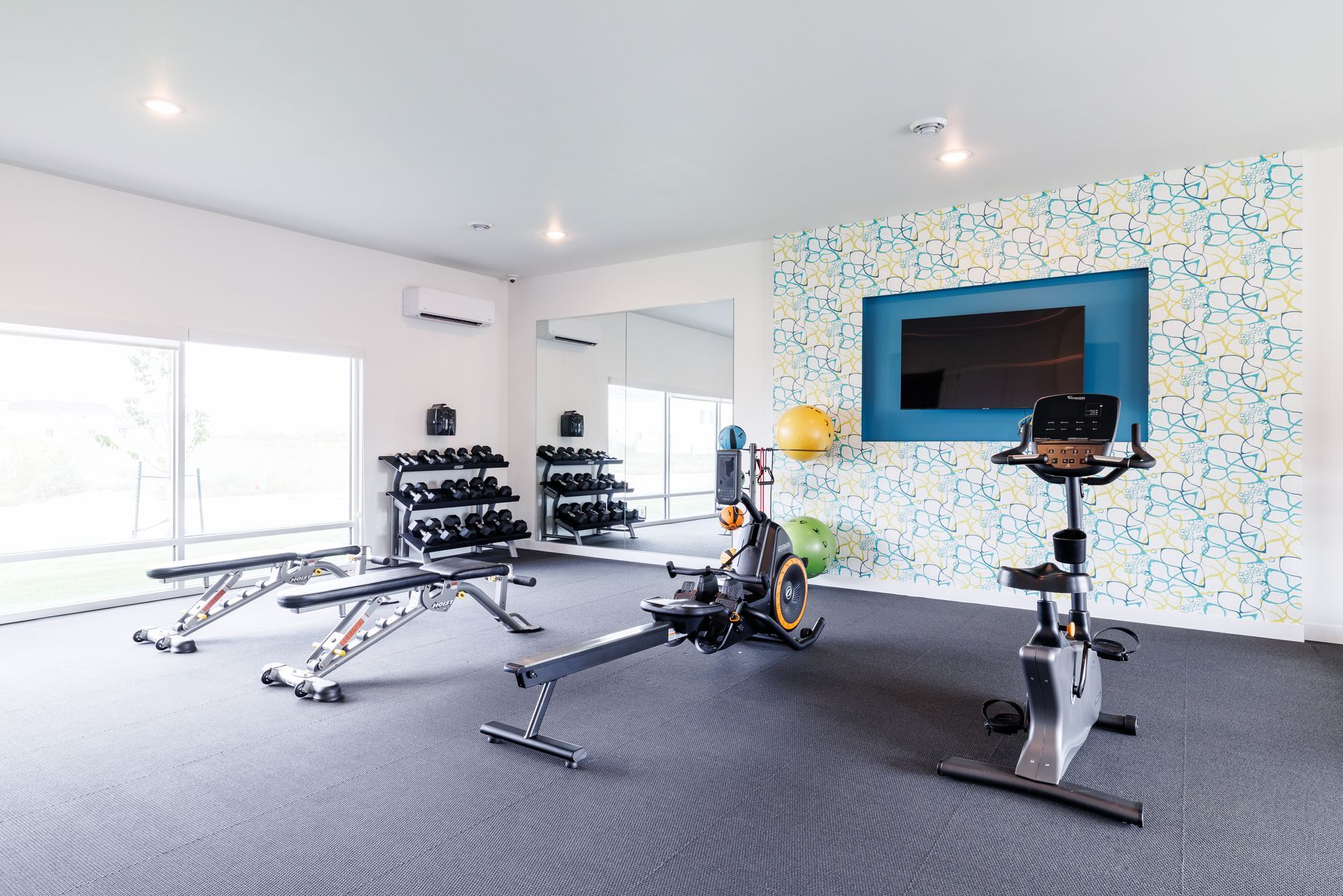 Gym with fitness equipment.