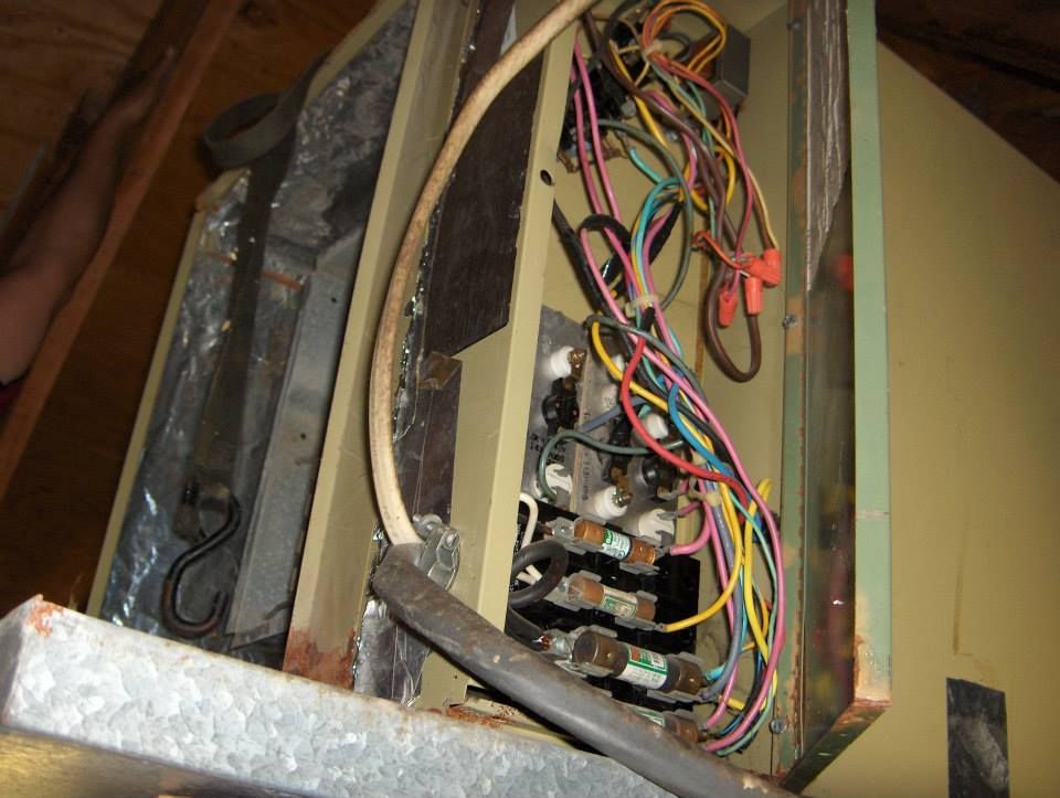 A box with a bunch of wires coming out of it