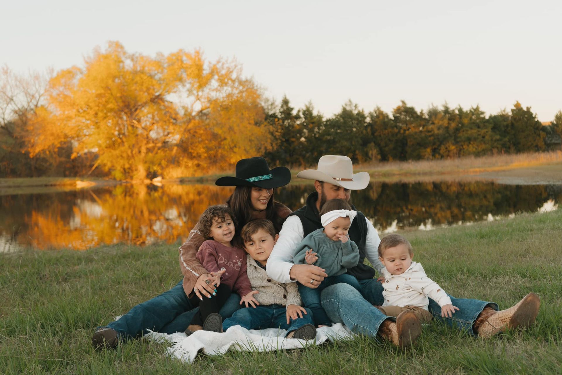 Two men are working on the roof of a house.