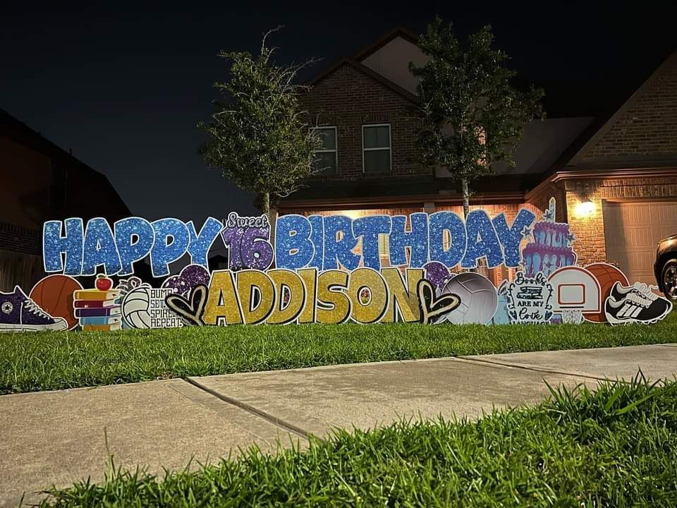 A birthday sign for addison is in front of a house.