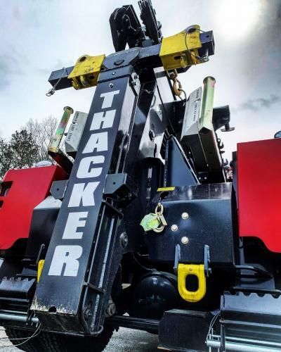 Black and red tow truck with 