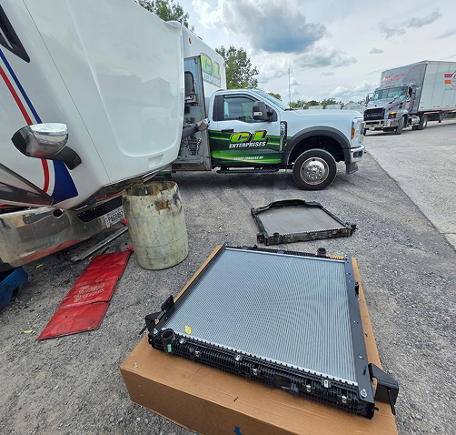 Radiator on box outside near CL Enterprises truck | CL Enterprises