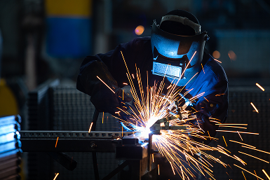 Technician performing welding | CL Enterprises