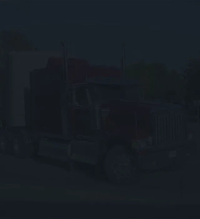 Red semi truck in background with blue overlay | CL Enterprises