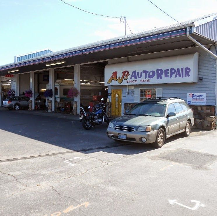 Auto Repair Shop Exterior With Vehicles Parked Outside | AJ’s Auto Repair