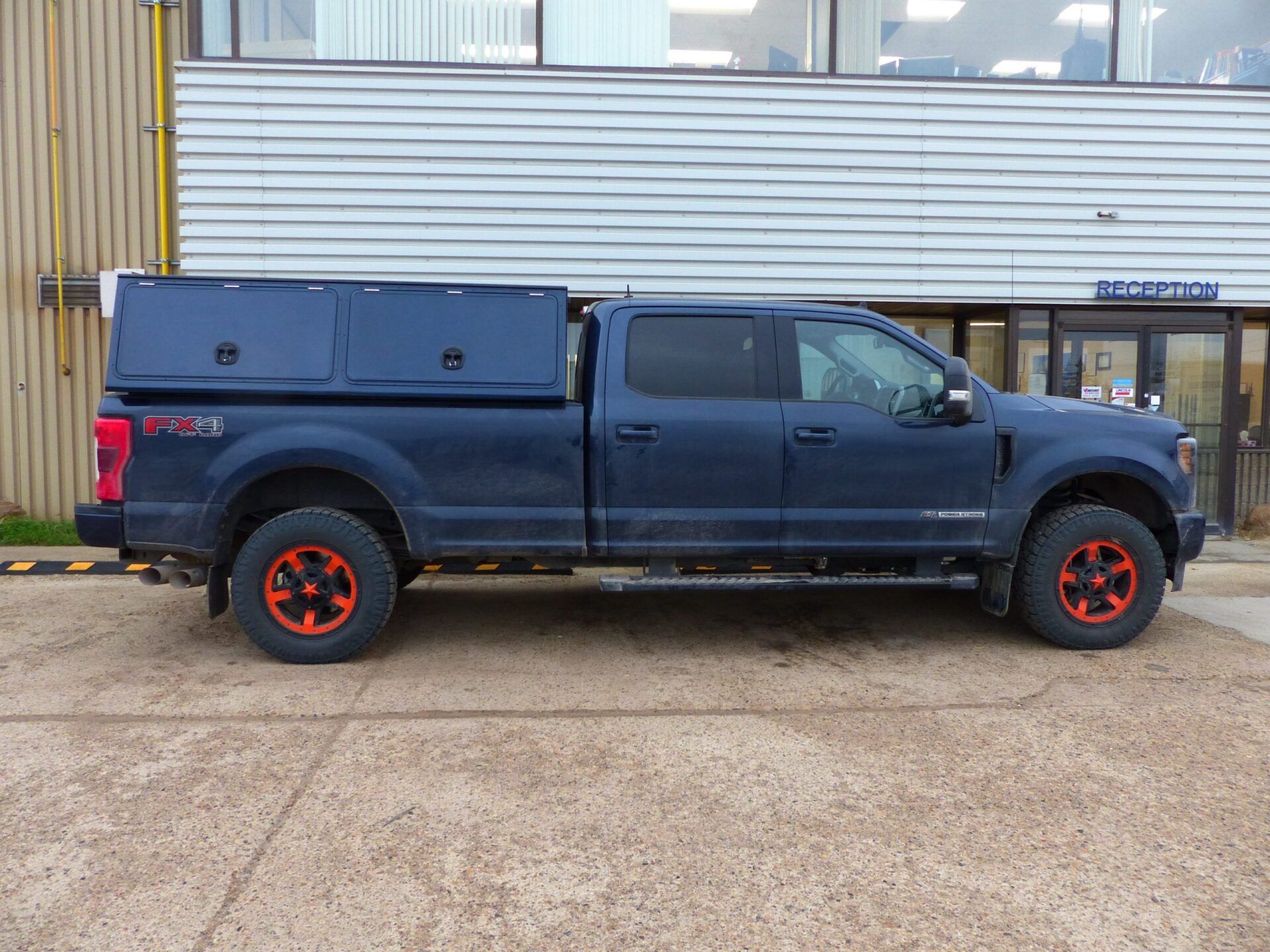 blue minitruck with canopy/capsule