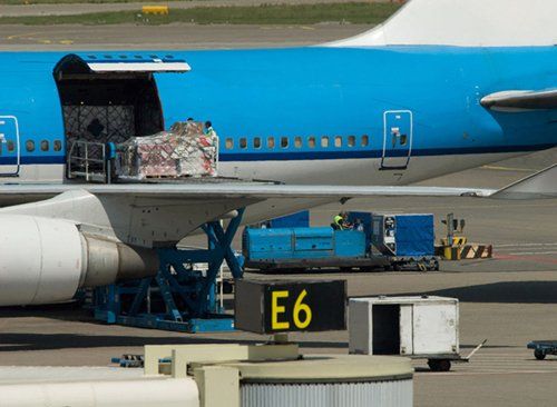 aircraft loading cargo on airport