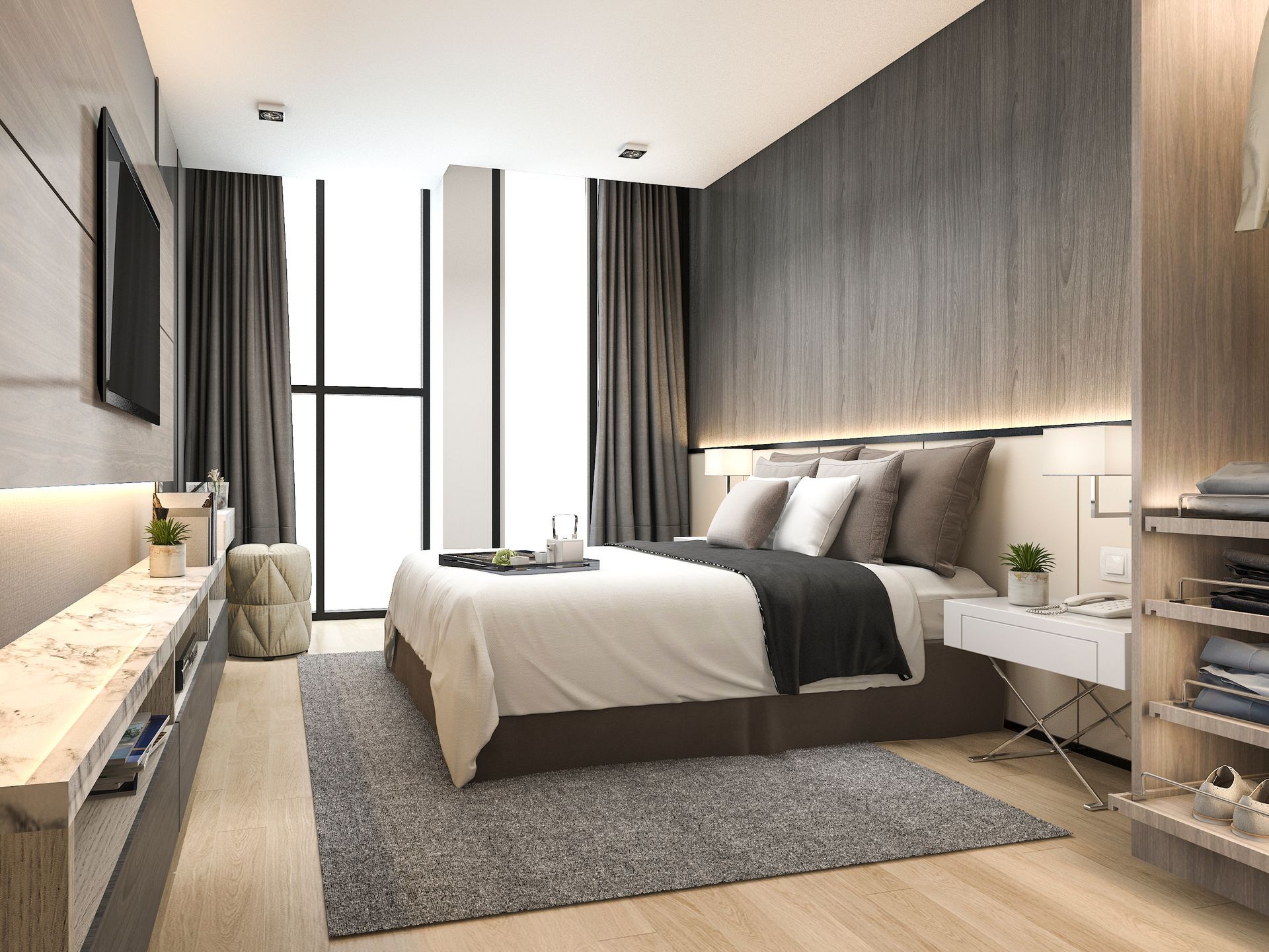 Modern minimalist bedroom with a bed, gray accent wall, rug, and large window.