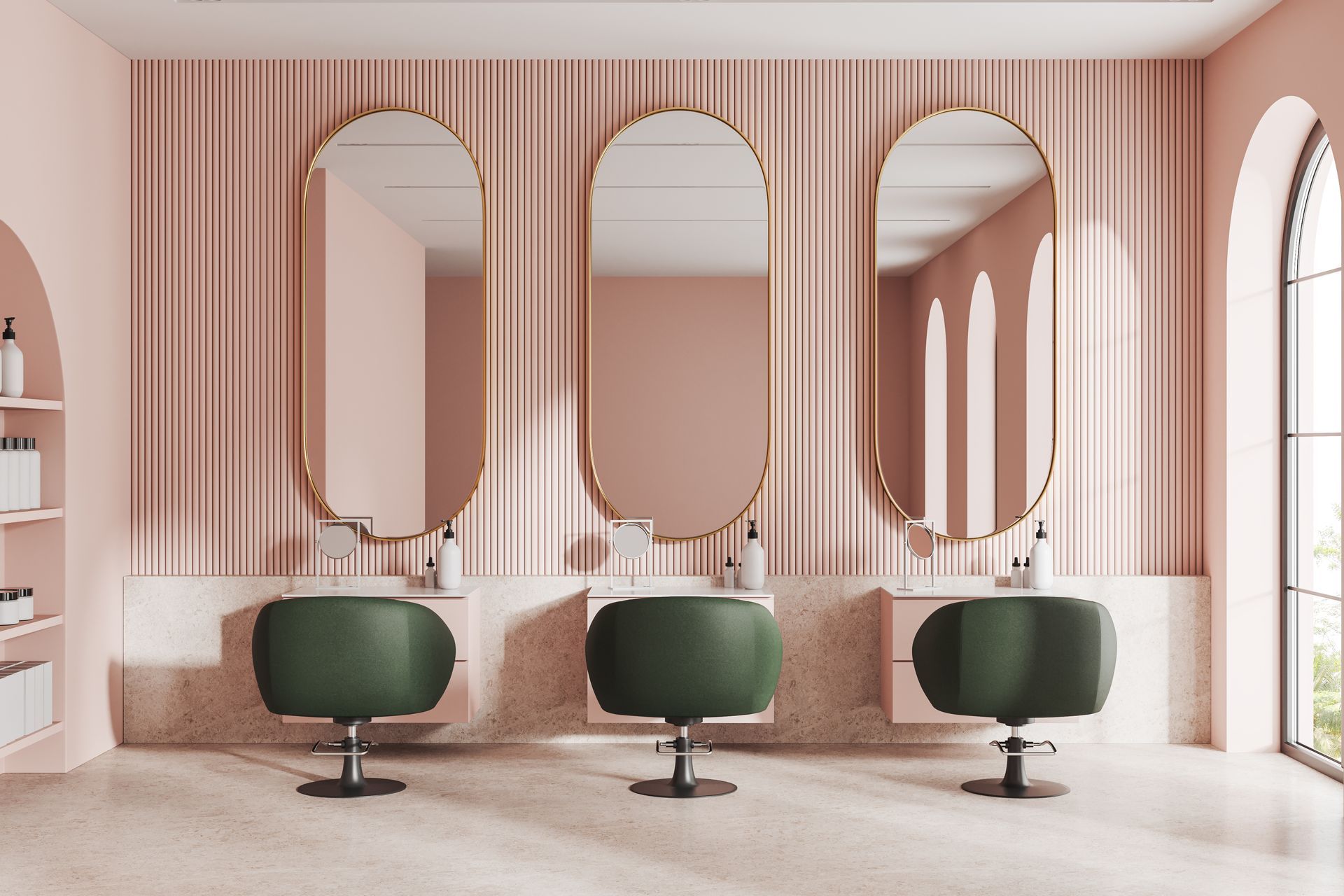 Elegant salon interior with three green chairs, tall mirrors, and pink striped walls
