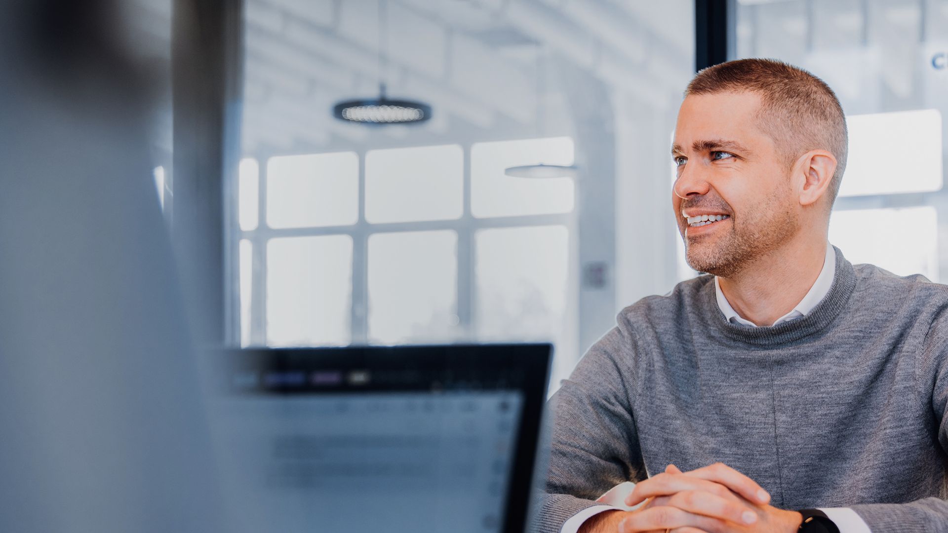 An zoi employee looking at the camera