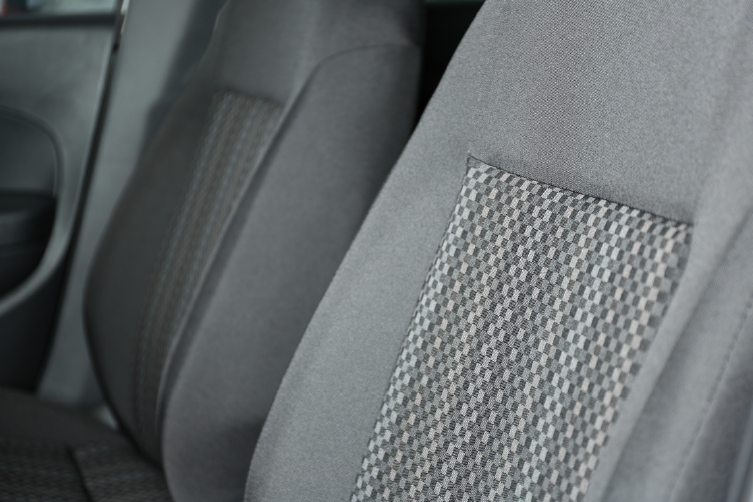 A close up of the back seat of a car.