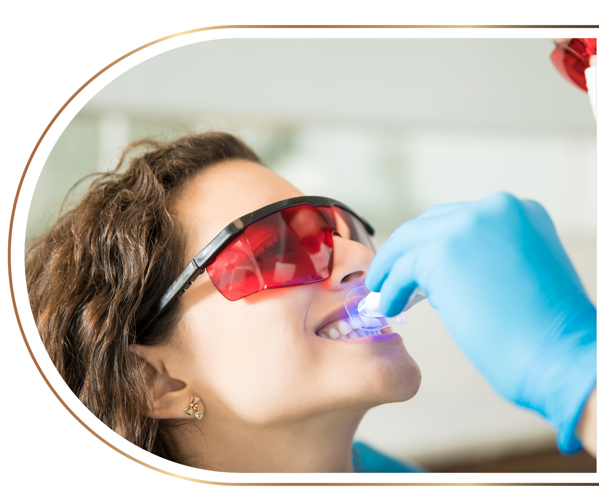 A woman wearing glasses and blue gloves is brushing her teeth