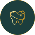 An icon of a tooth with a heart shaped crown on a green background.