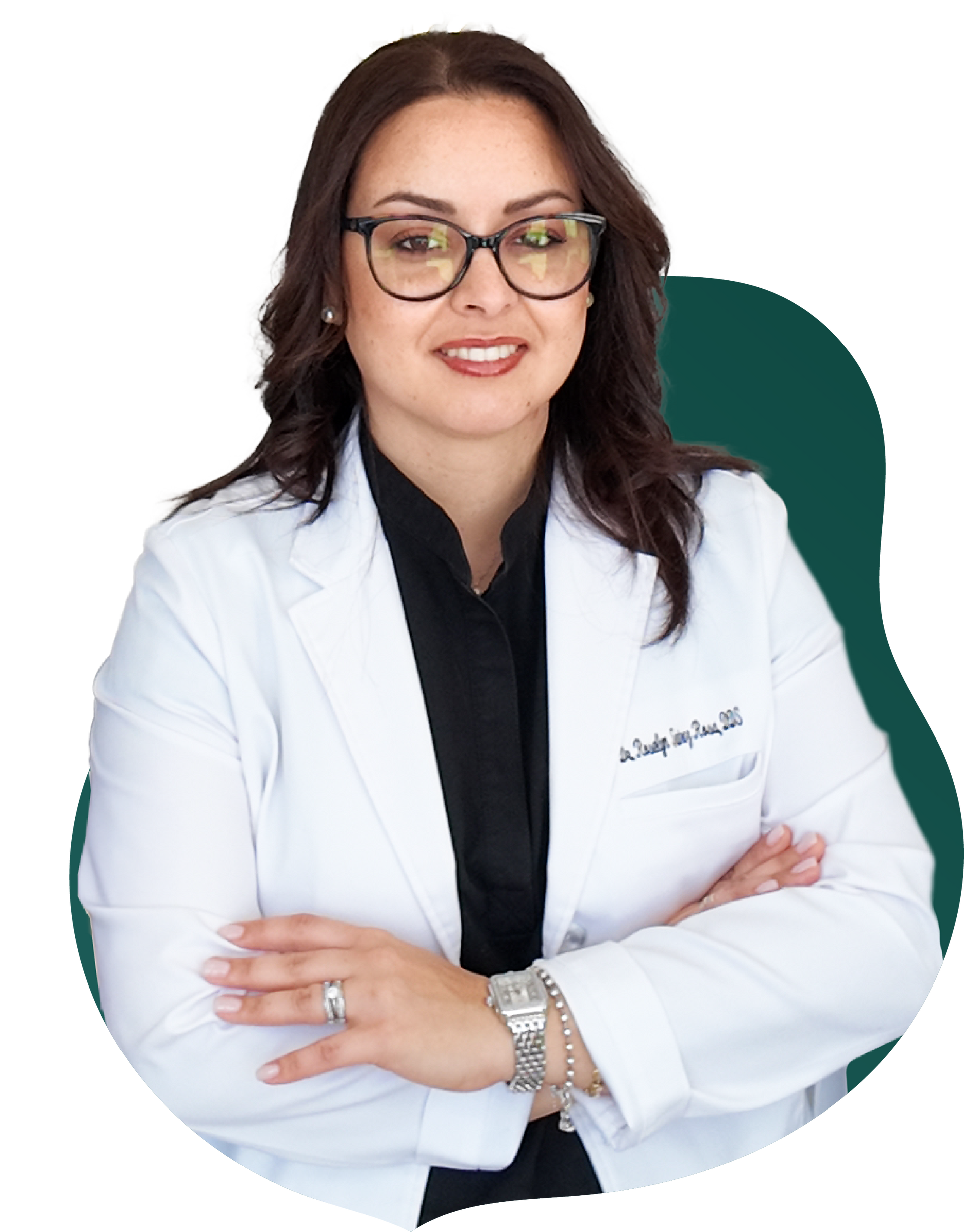 A woman in a white coat is holding a dental mirror.