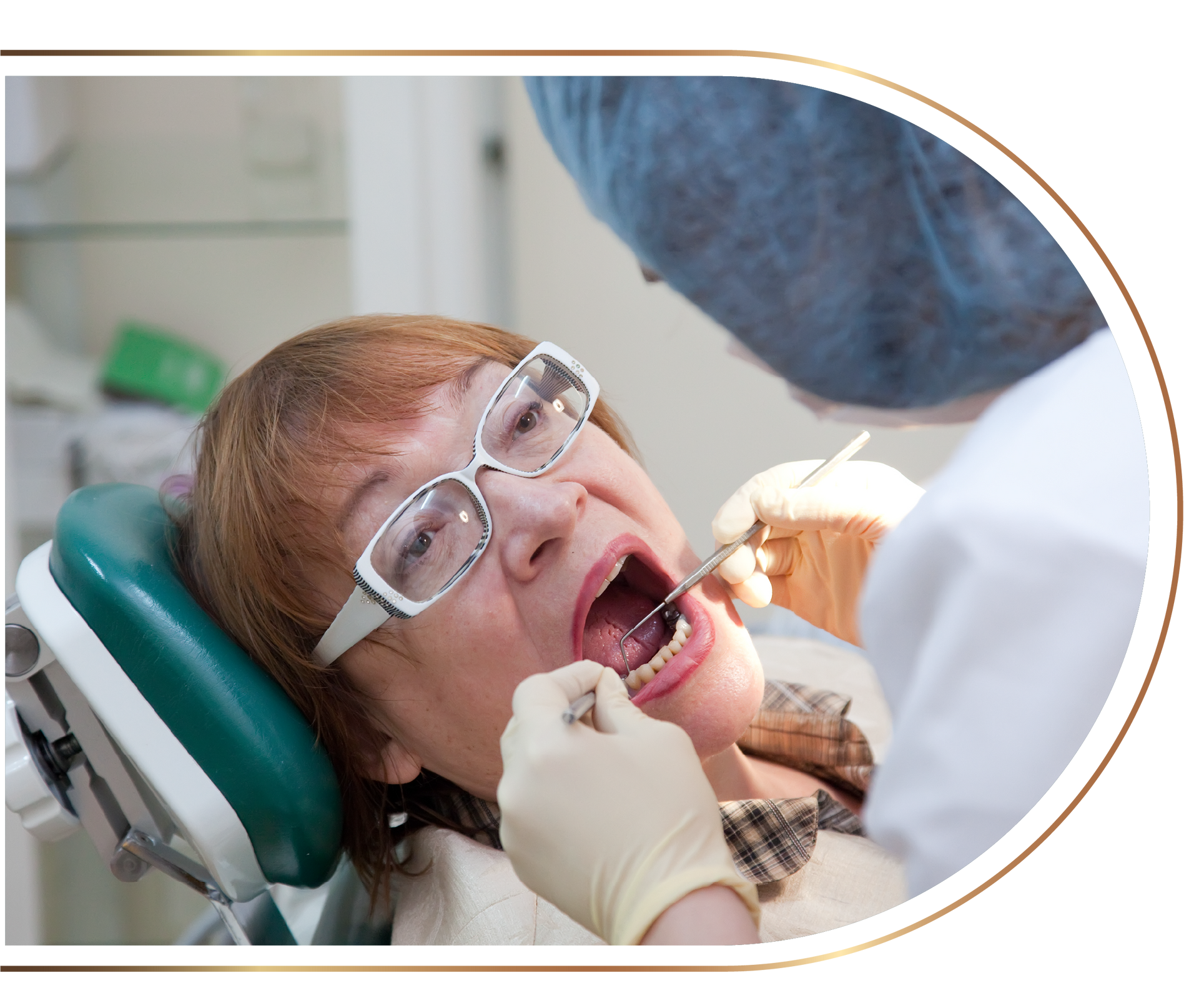 A woman with glasses is getting her teeth examined by a dentist.