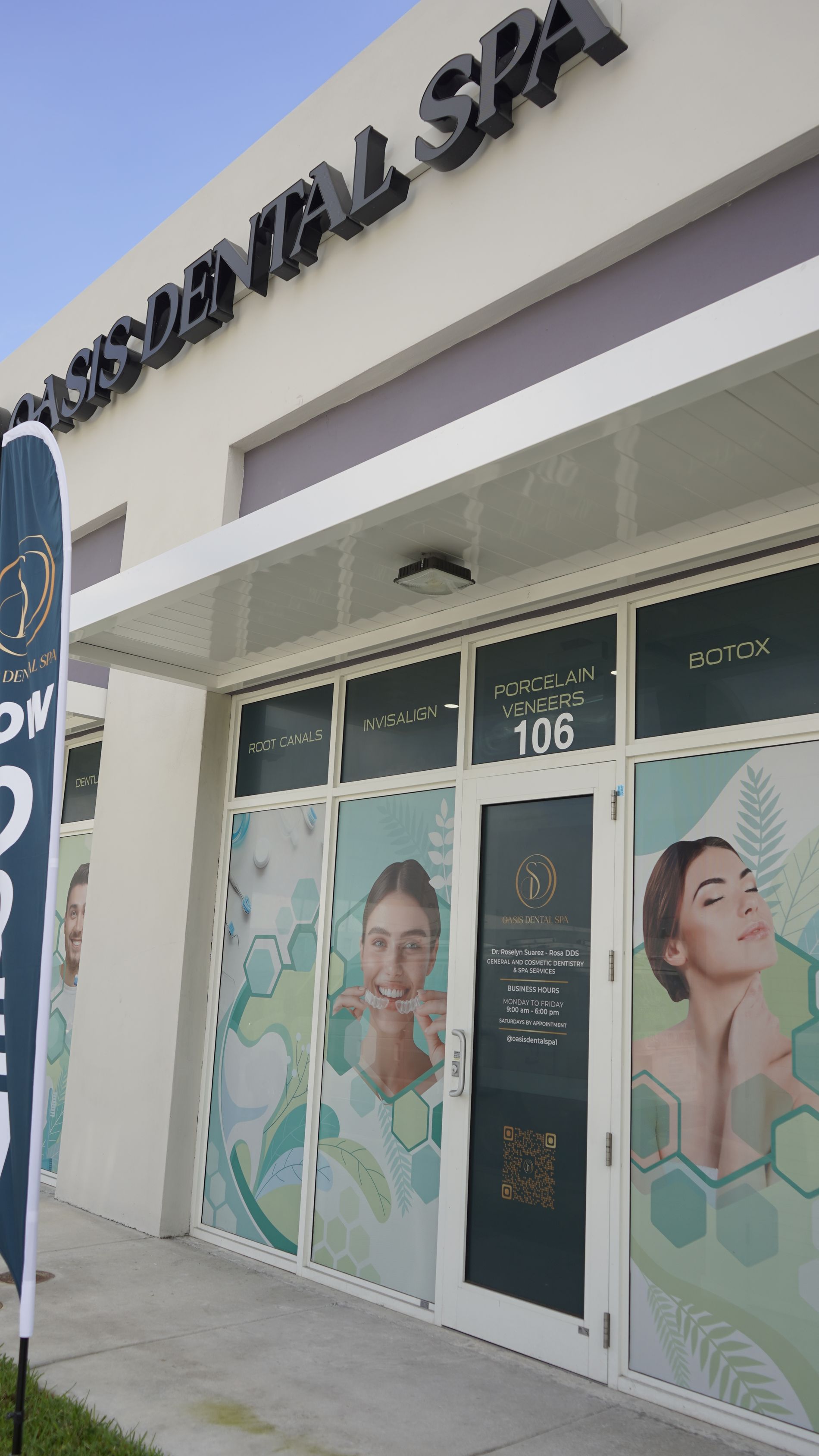 A building with a sign that says dental spa on it