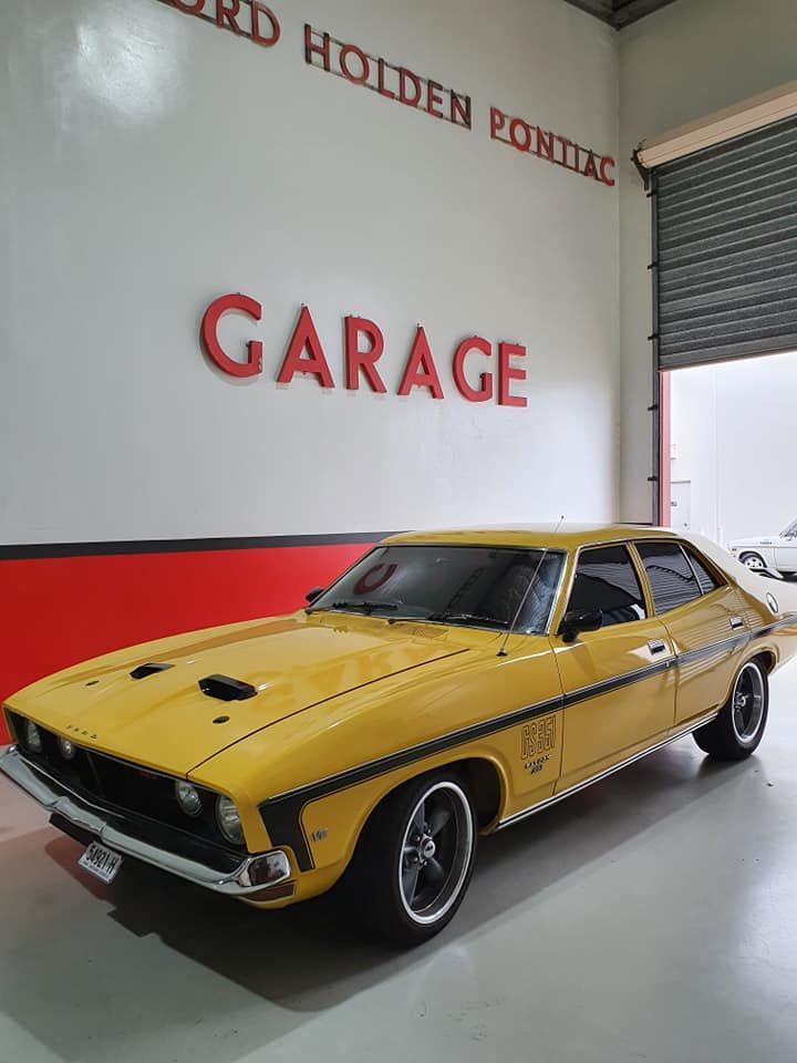 Yellow Classic Car Parked Inside a Garage — Motorhead Garage in Tweed Heads, QLD
