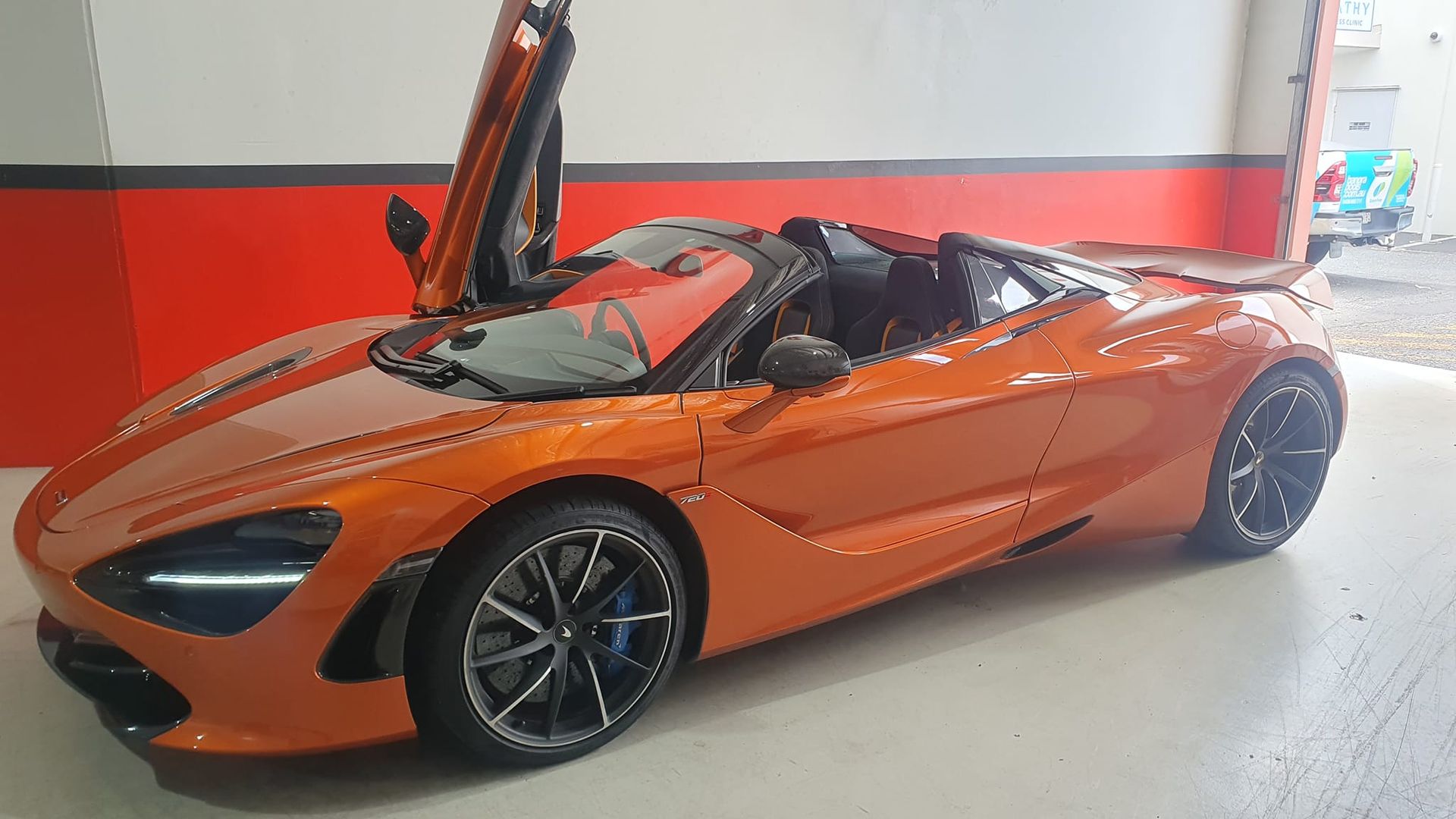 Hands in Black Gloves Installing a Clutch Disc in a Car's Transmission — Motorhead Garage in Tweed Heads, QLD