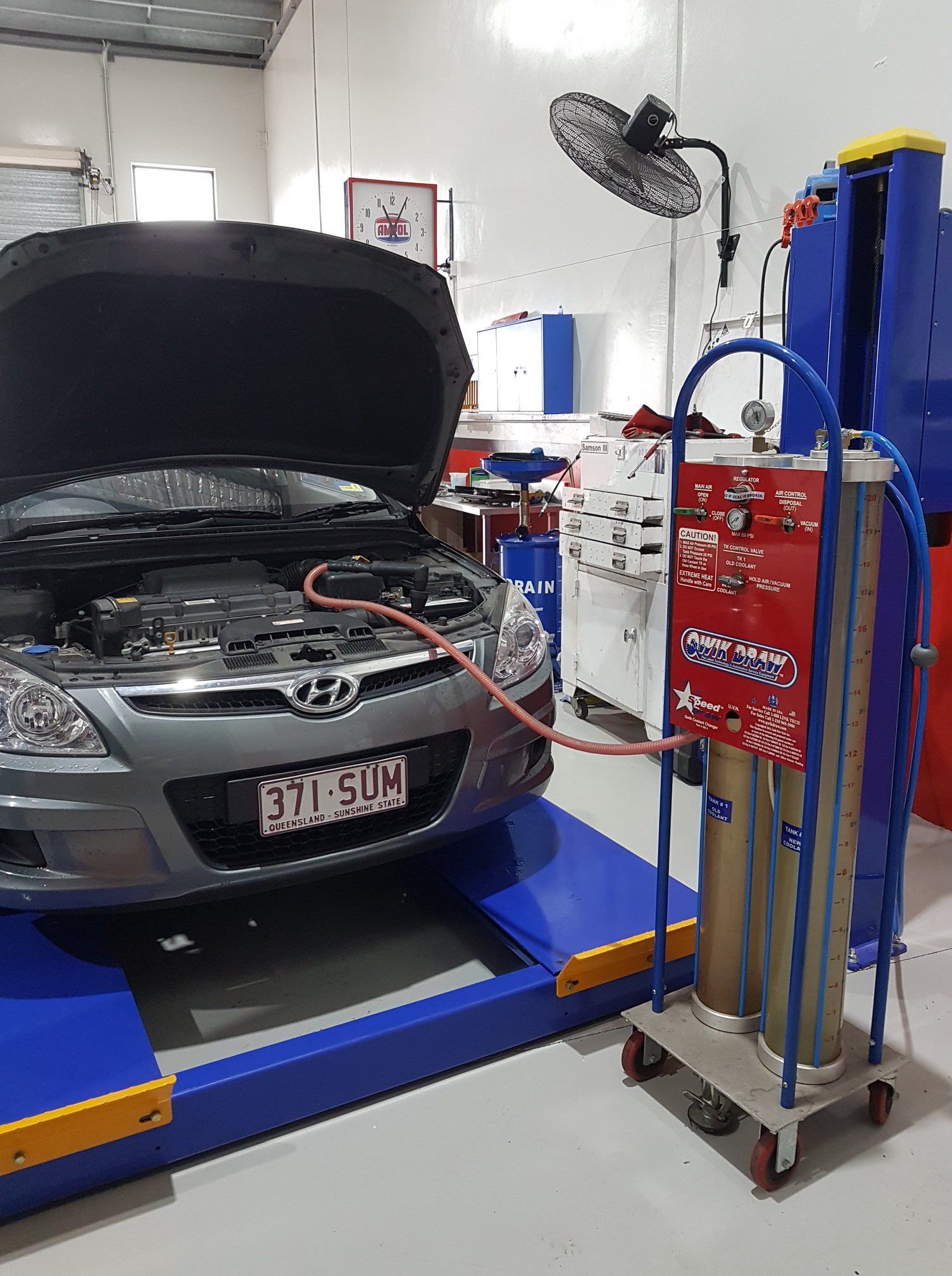 Car Being Serviced With Diagnostic Equipment Attached in a Repair Shop — Motorhead Garage in Tweed Heads, QLD