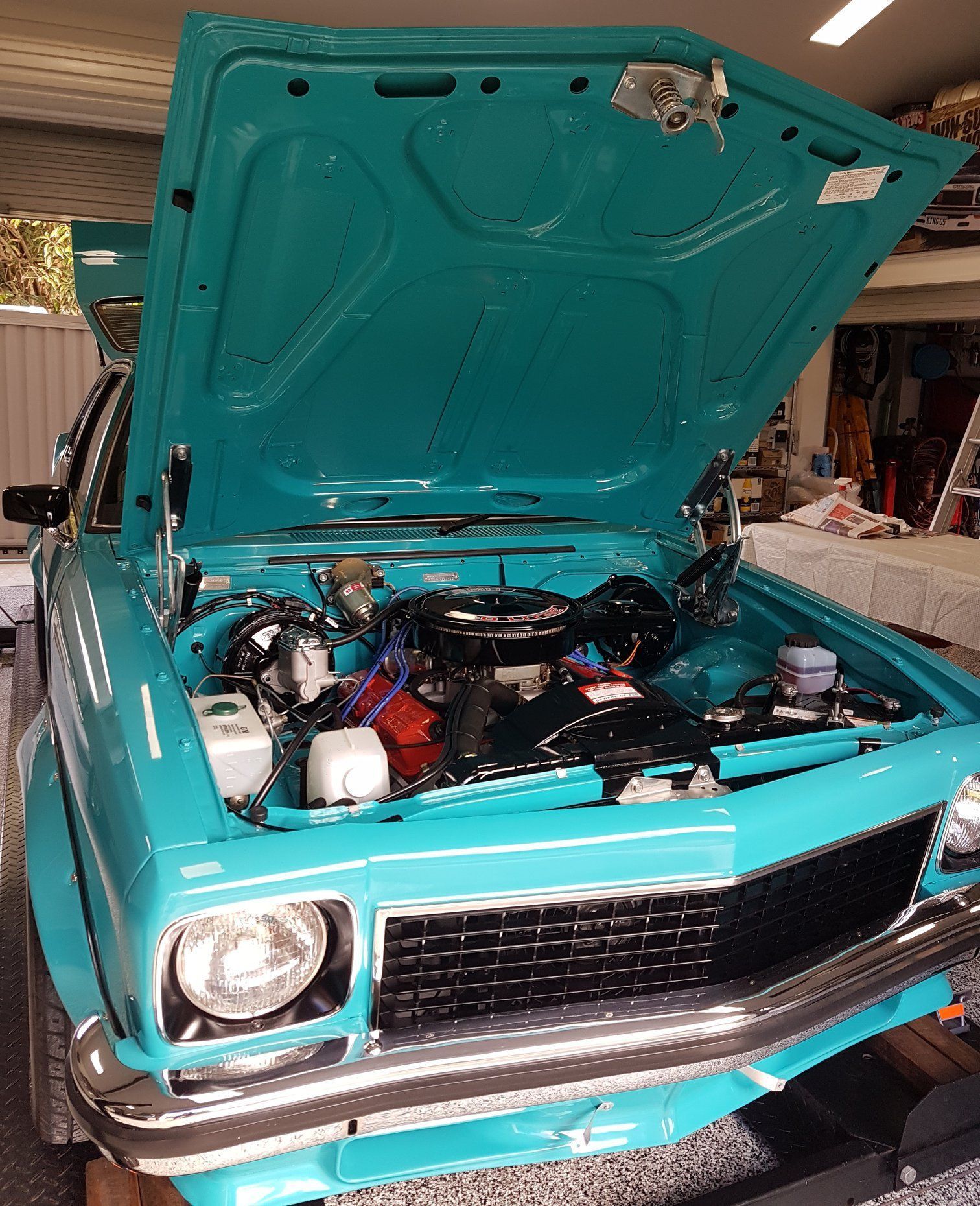 Teal Classic Car With Hood Open, Showing Engine in a Garage — Motorhead Garage in Tweed Heads, QLD