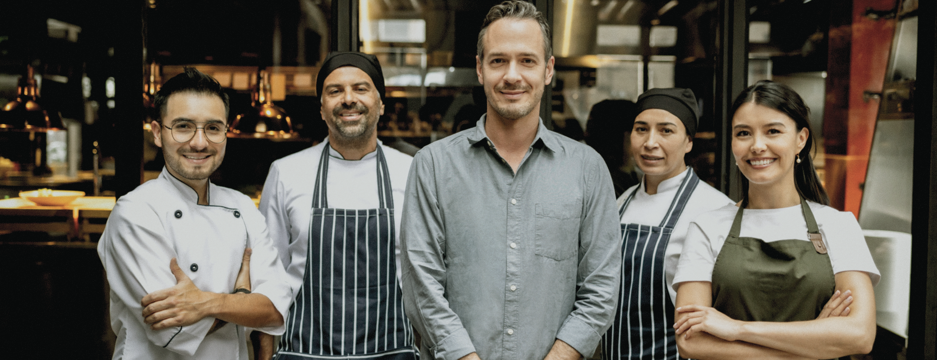 About Us Header image of chef's posing for photo