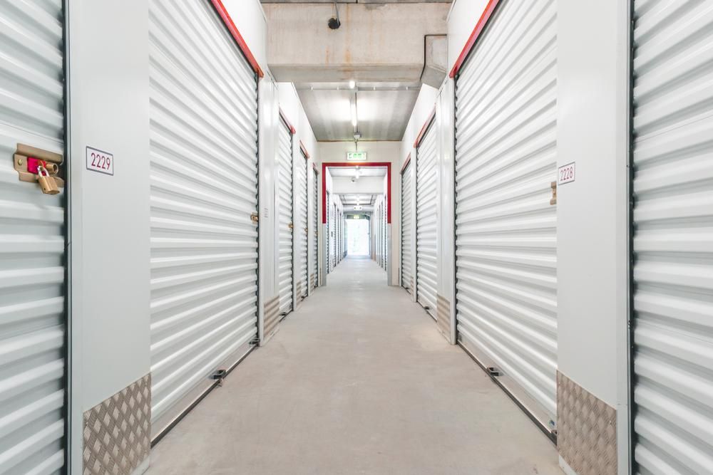 A Long Hallway Filled With Lots Of Empty Storage Units — Raymond Terrace Public Storage In Raymond Terrace, NSW