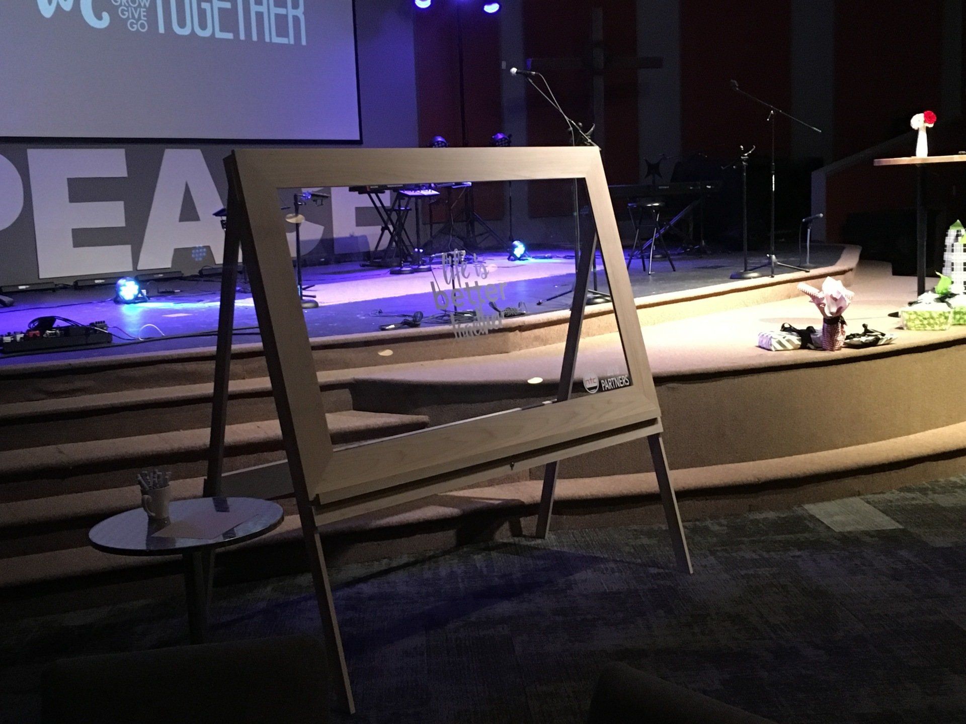 A stage with a sign that says peace on it