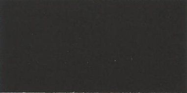 A close up of a black surface with a white border.