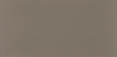 A close up of a brown tile that looks like a piece of paper.