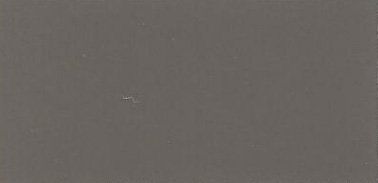 A close up of a gray surface with a grainy texture.