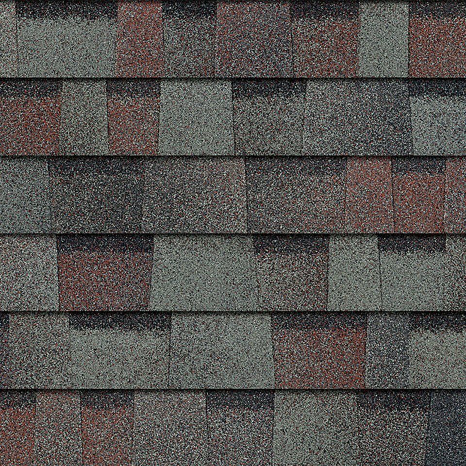 A close up of a row of shingles on a roof.
