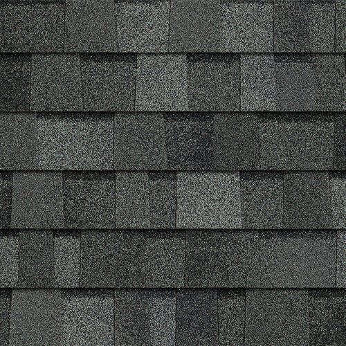 A close up of a row of shingles on a roof.