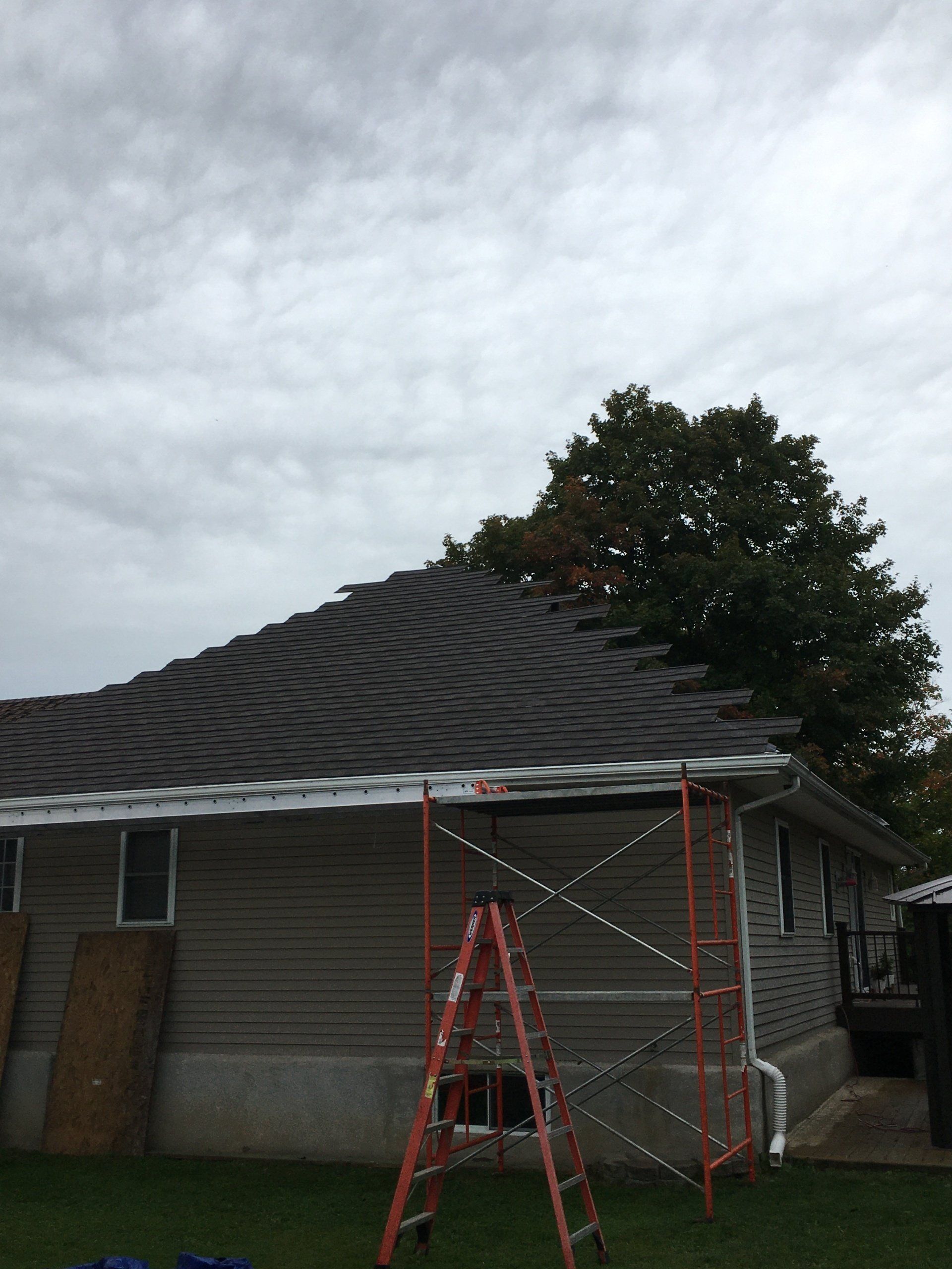 A house with a ladder in front of it