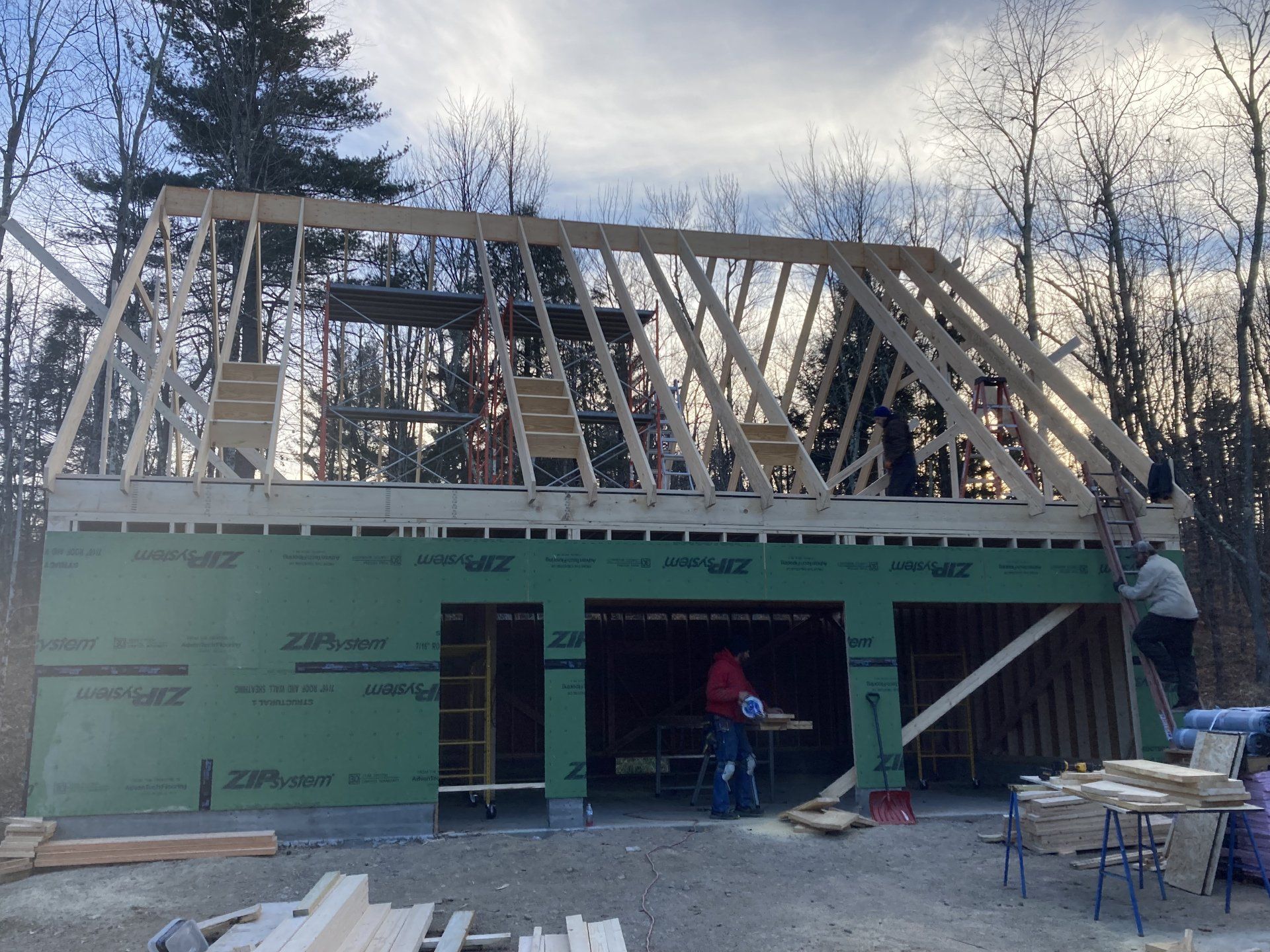 A building under construction with a green roof