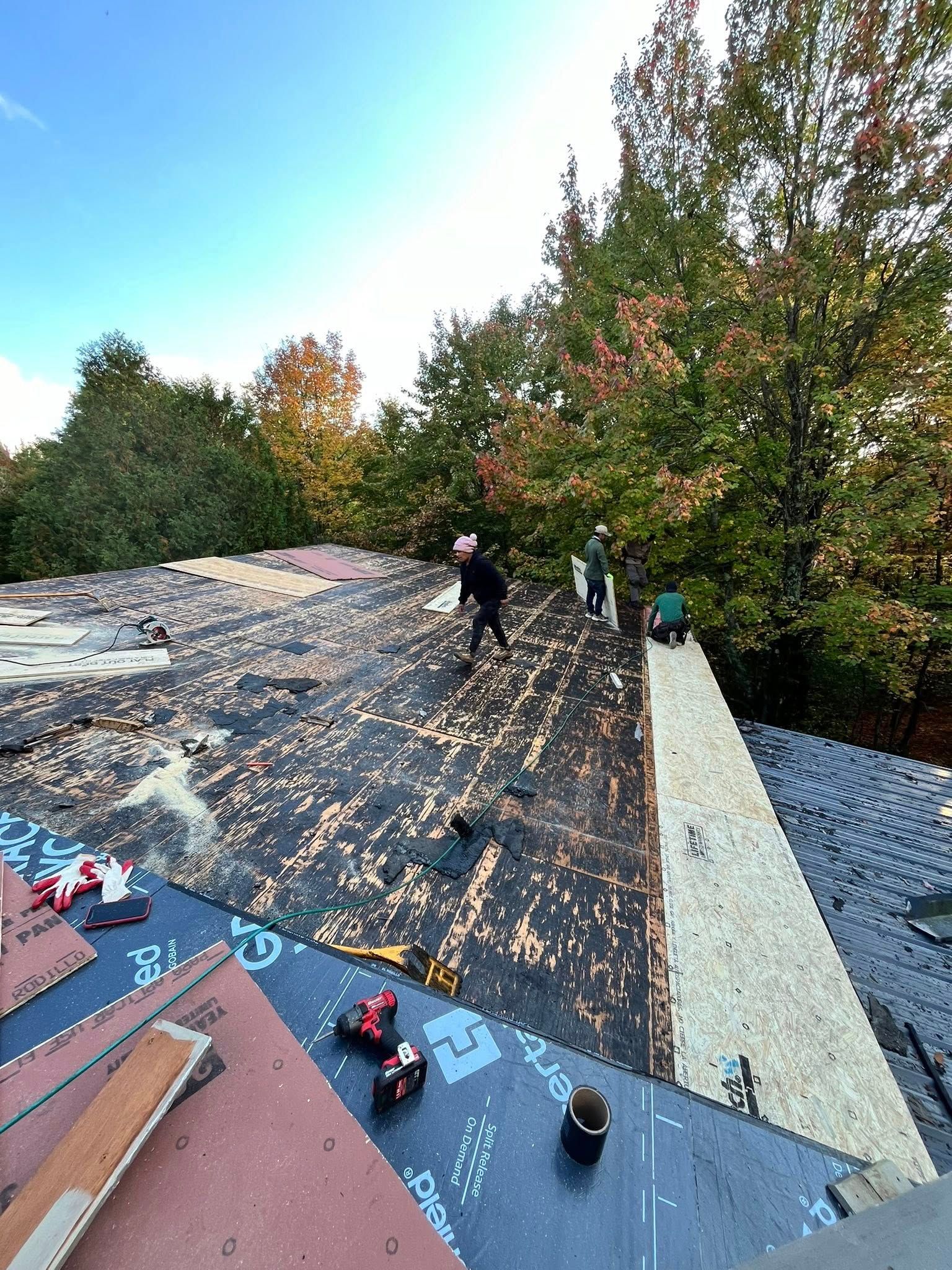 A house with a pool in front of it