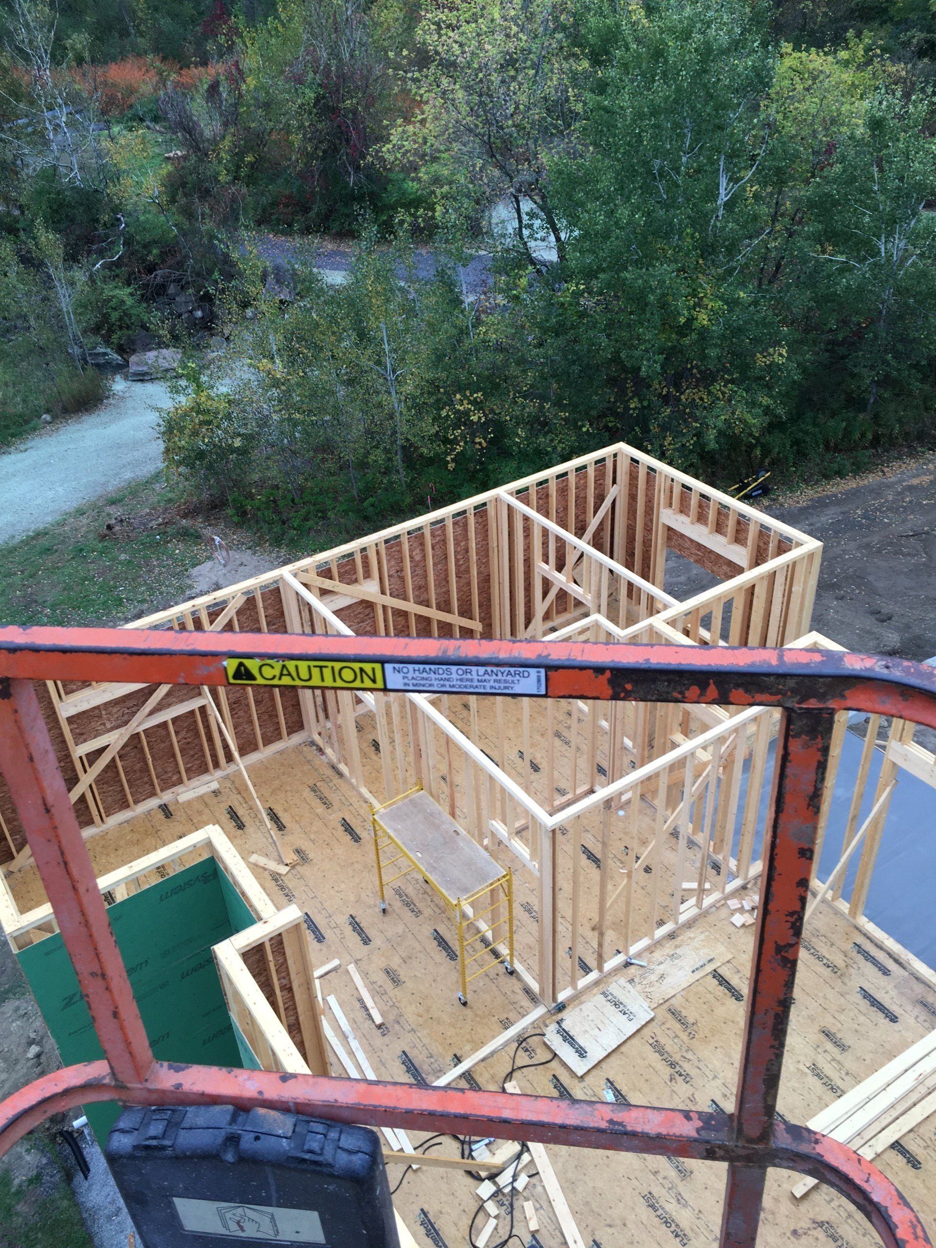 A view of a house being built from a crane.