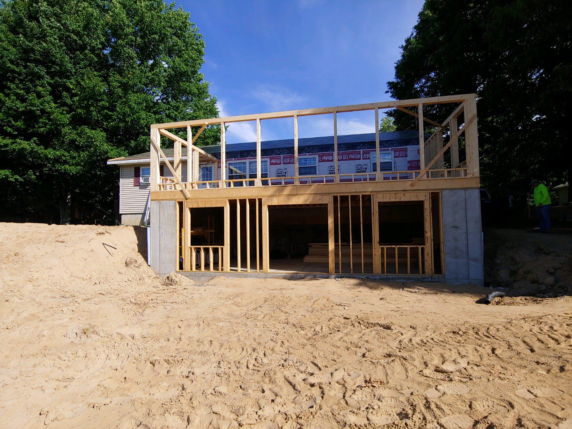 A house that is being built with a lot of wood